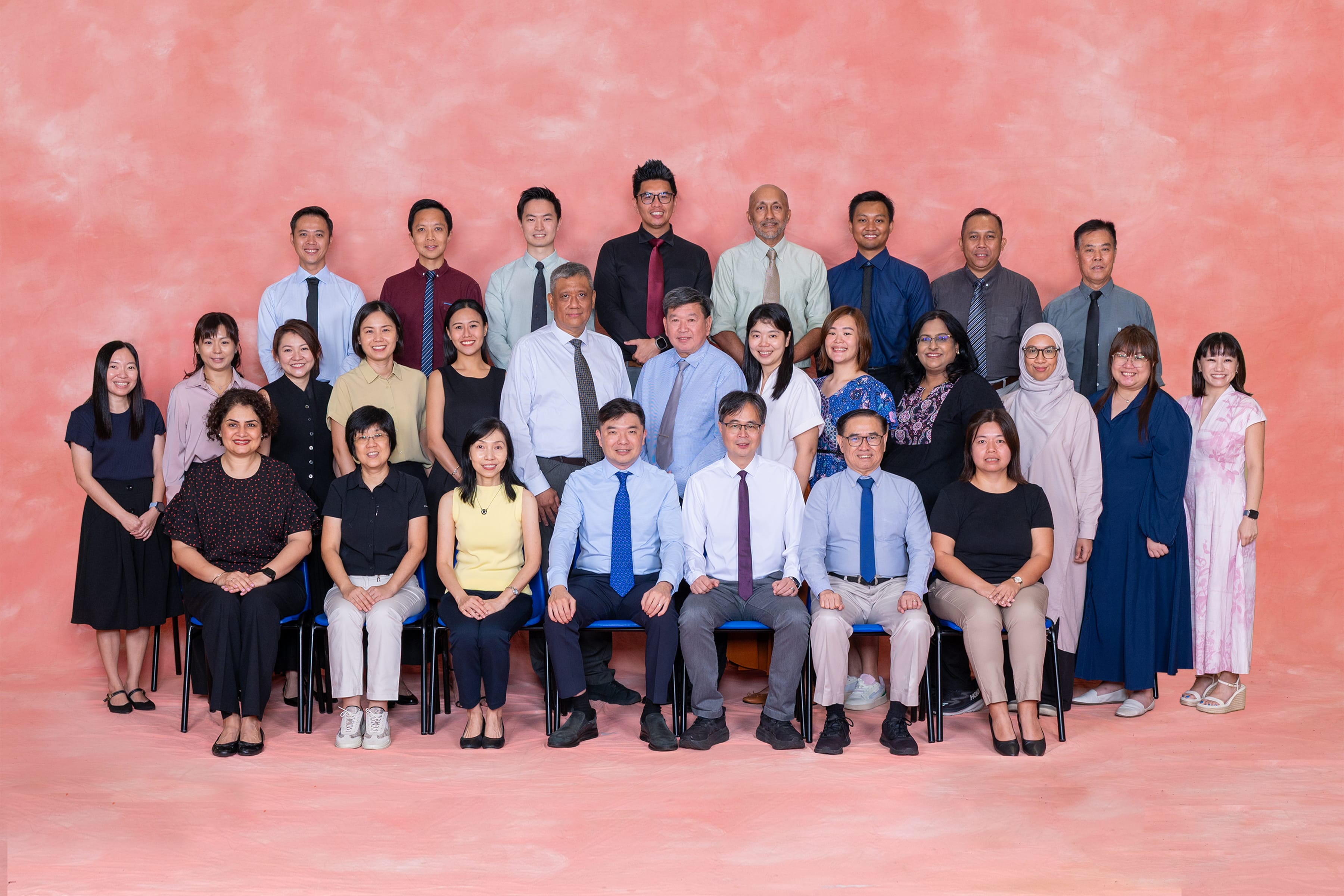 This photo contains the EXCO staff from Assumption English School
